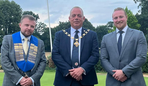 Gary and Joe are pictured with London President Michael Tiney. 