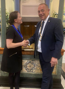 New Chairman Victoria, pictured with LAFD President Michael